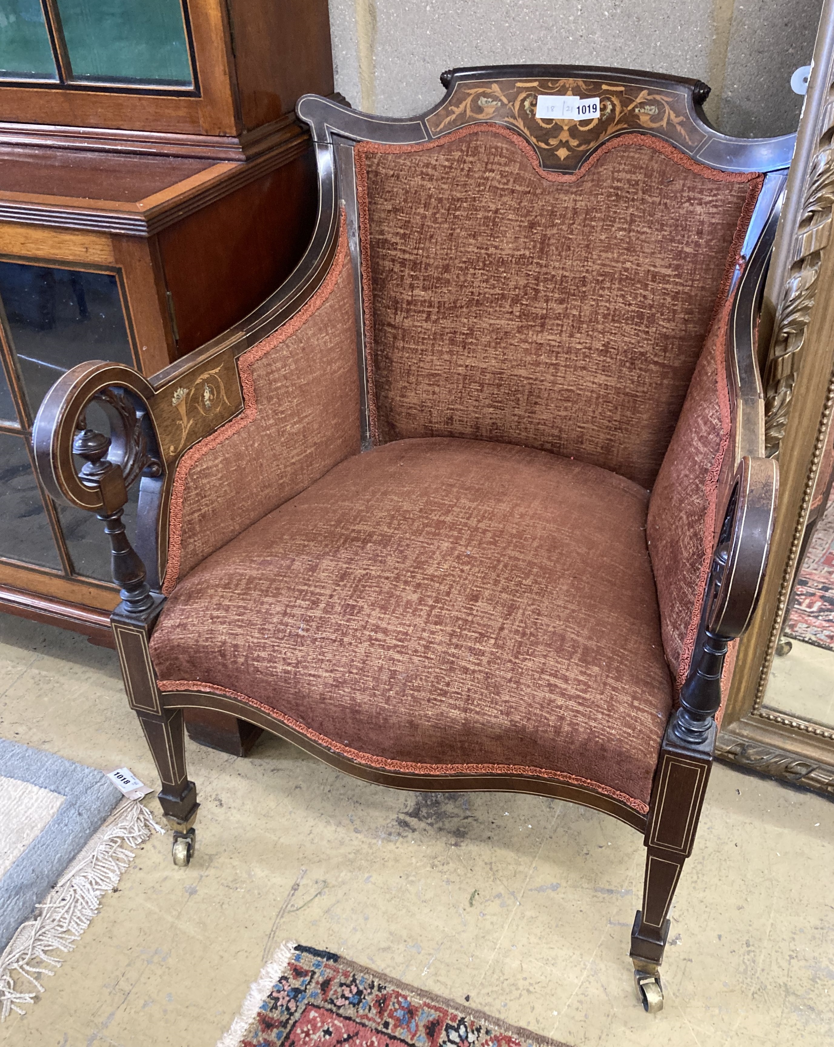 A late Victorian marquetry inlaid rosewood armchair, width 62cm, depth 70cm, height 78cm